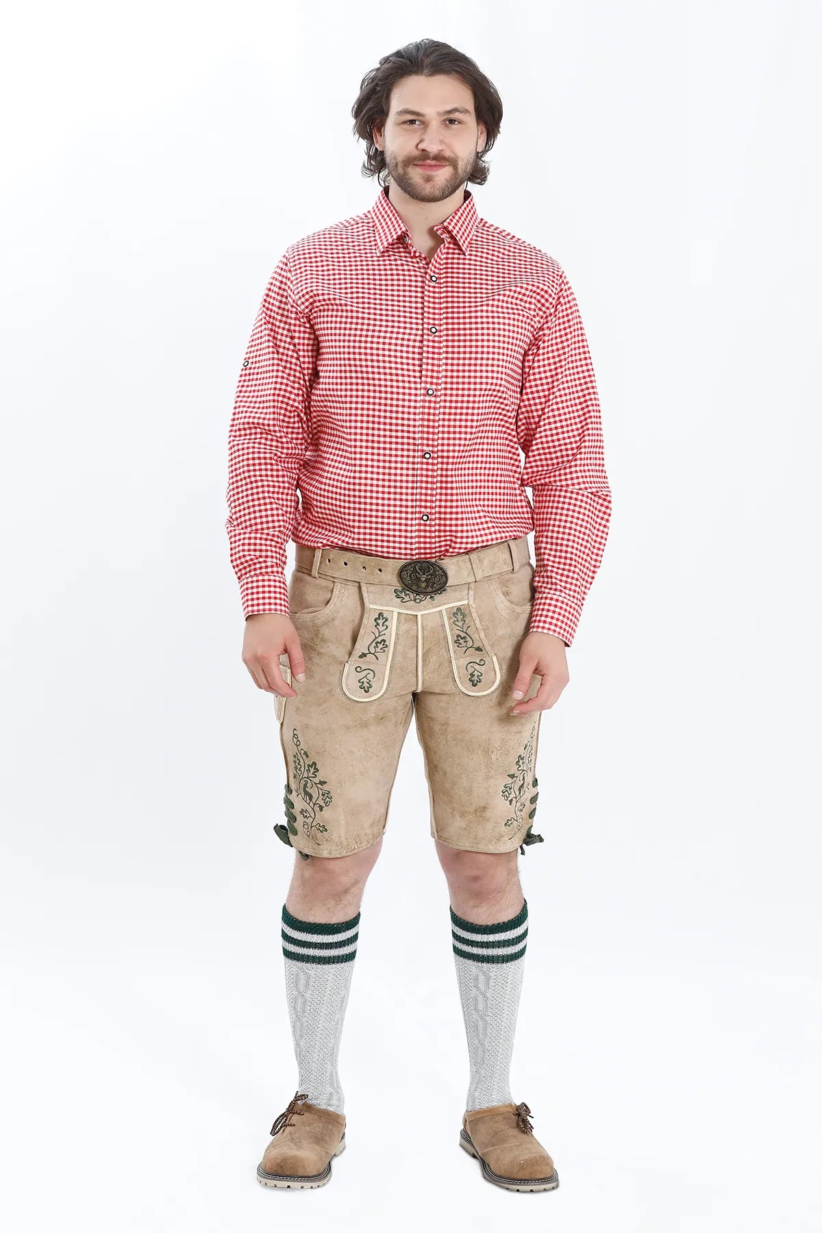 Lederhosen Men in Beige Brown Color with Traditional Green Embroidery. Model is wearing Checkered shirt and Traditional Bavarian Shoes.