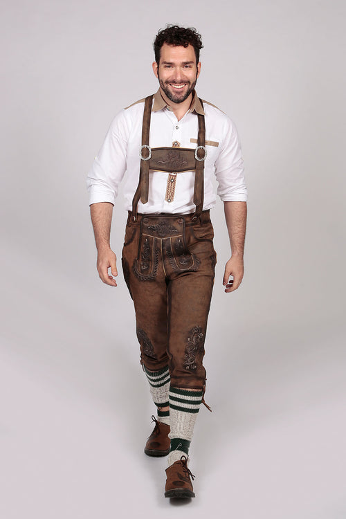 Dark brown knee-length leather shorts with cream rope embroidery and ornate bib panels and side ties