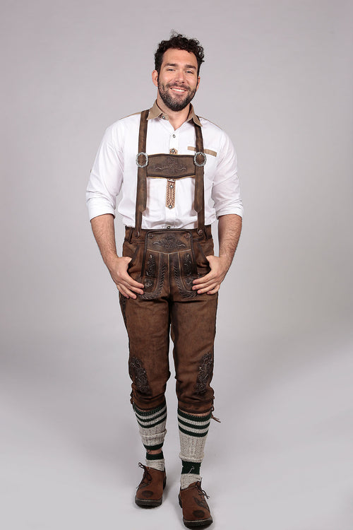 Dark brown knee-length leather shorts with cream rope embroidery and ornate bib panels and side ties