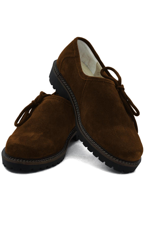 Light brown suede shoes with dark sole, rope lacing, and thick crepe heel for Bavarian Alpine wear