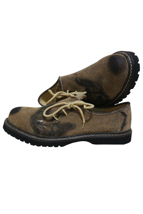 Light brown suede shoes with black trim, rope laces, and a thick crepe sole for Bavarian folk wear