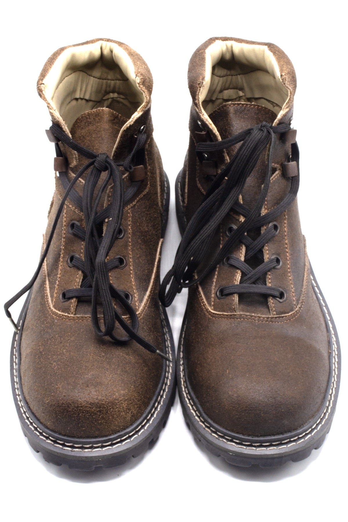 Pair of brown leather boots with black laces on a white background