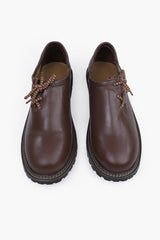 Brown leather Trachten shoes with braided rope lacing and chunky lug sole for traditional alpine wear