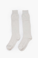 Off-white wool Trachten knee socks with textured cable knit weave and reinforced heel and toe