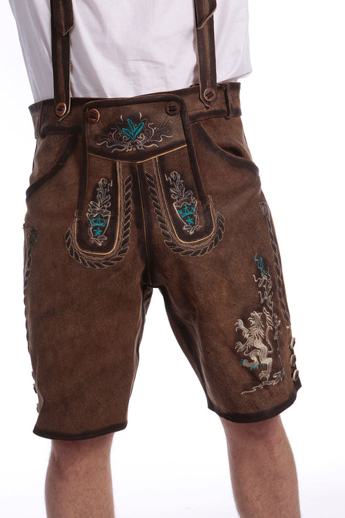 Deep brown suede knee-length shorts with teal heart embroidery, ornate bibs, and brown leather braces