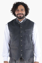 Charcoal grey wool vest with ornamental buttons, chest pocket, and refined tailoring for Alpine tradition