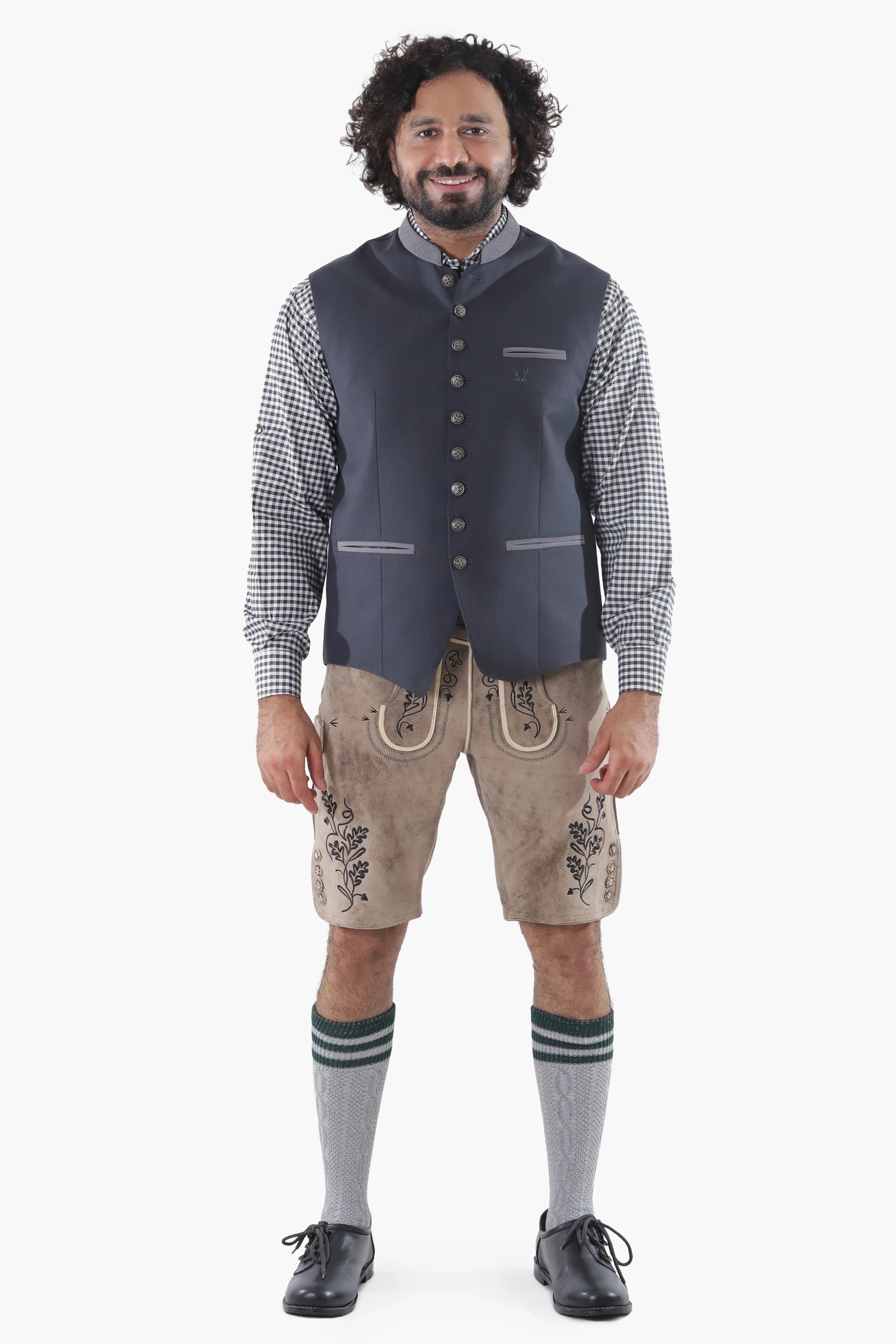 Charcoal black wool vest with button front, chest pocket, and refined tailoring for Alpine tradition