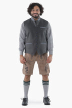 Steel grey wool vest with button front, breast pockets, and subtle grey piping for Alpine tradition