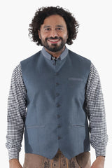 Classic grey Trachten waistcoat in soft wool featuring dark buttons and refined fit over checkered shirts