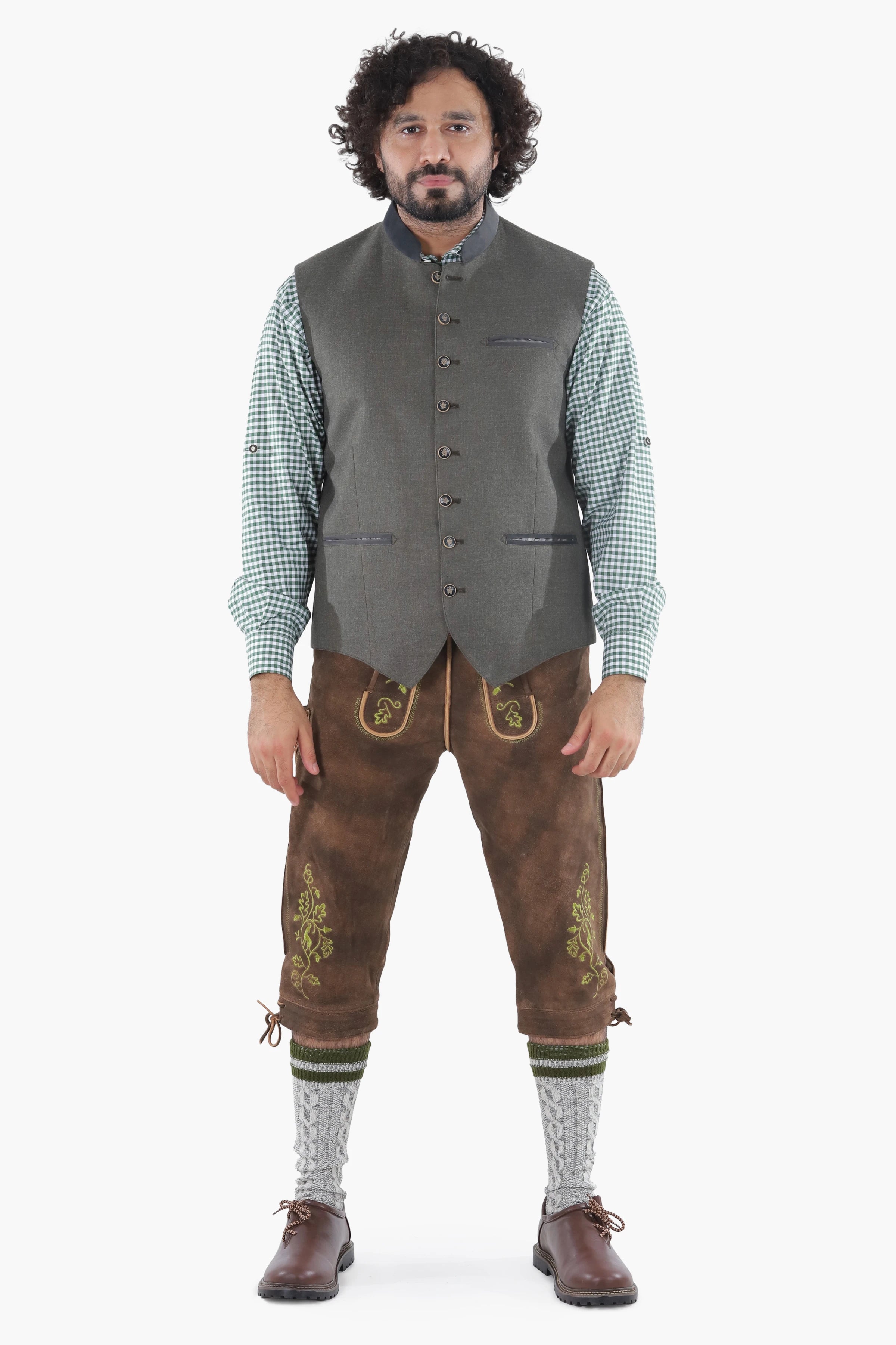 Forest green wool vest with dark leather trim, button front, and chest pockets for traditional Bavarian wear