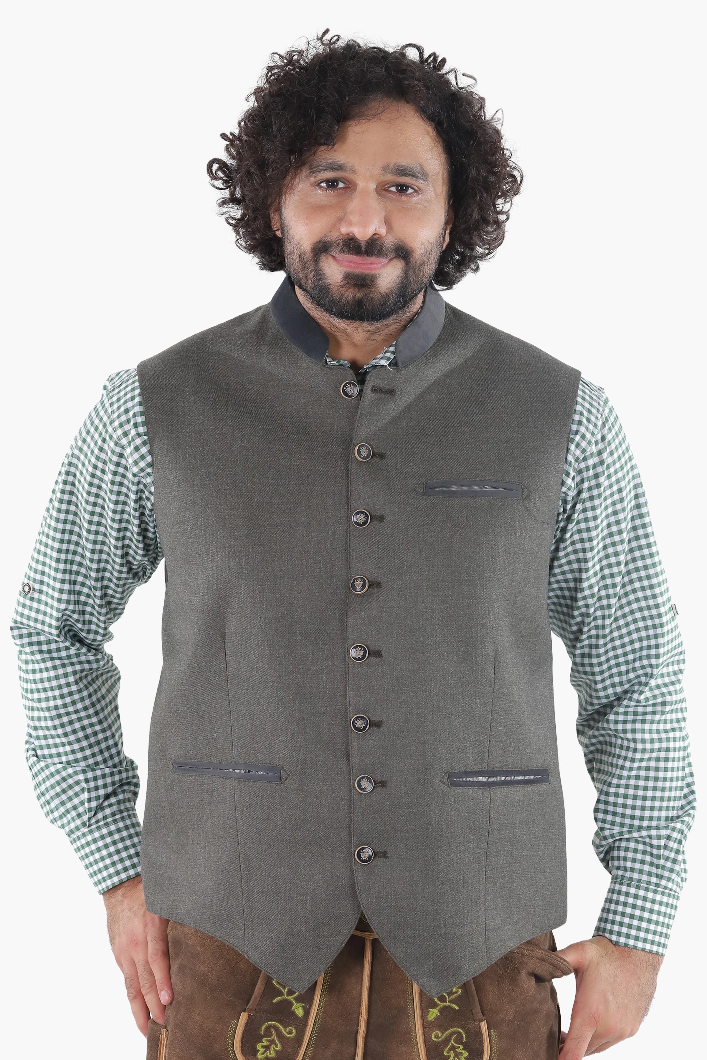 Forest green wool vest with dark leather trim, button front, and chest pockets for traditional Bavarian wear