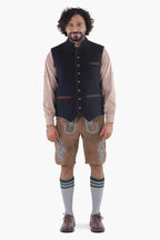 Navy tweed Bavarian vest with brown leather trim and decorative metal buttons, traditional folk styling