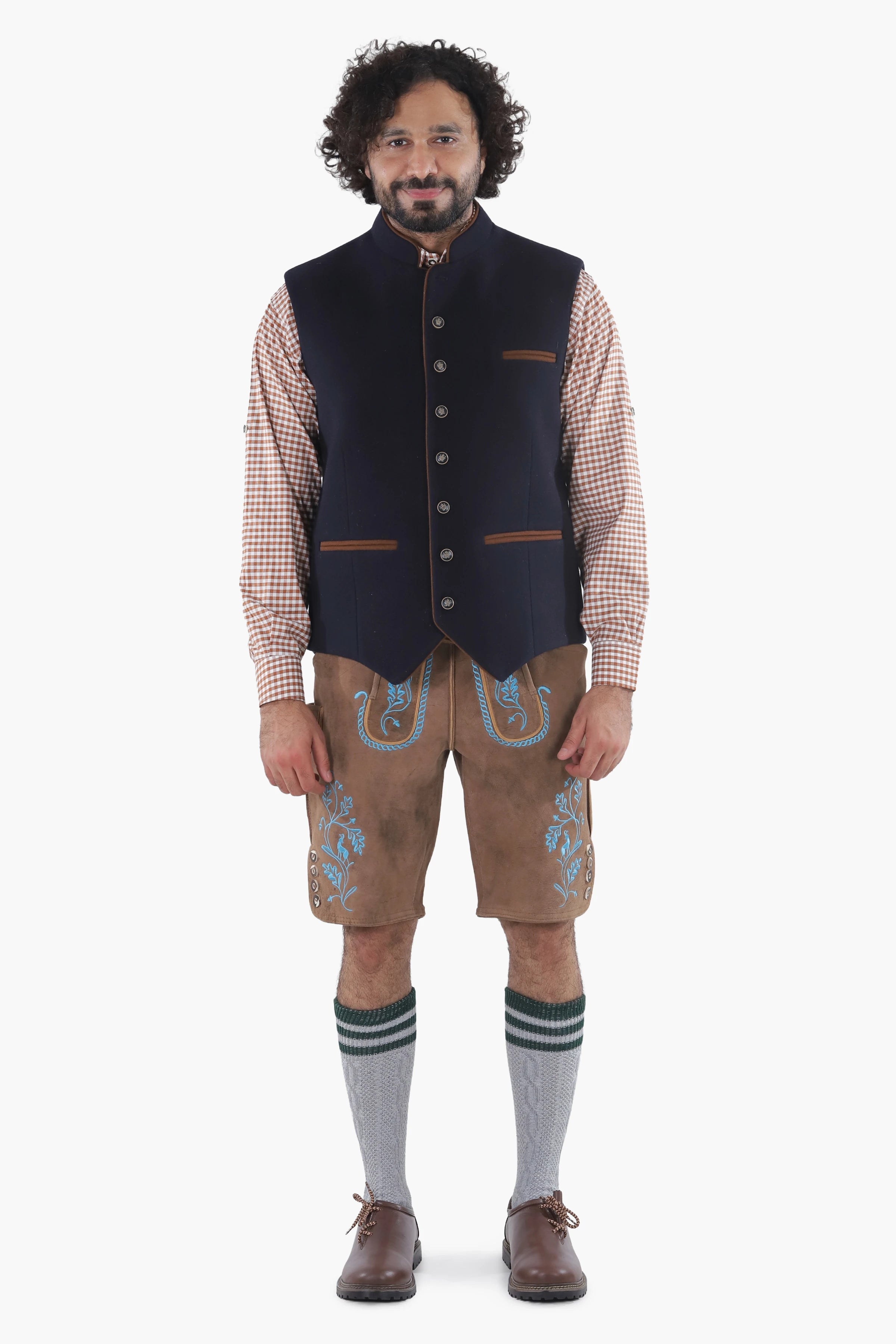 Navy tweed Bavarian vest with brown leather trim and decorative metal buttons, traditional folk styling